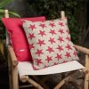 cojin-estrella-rojo-sale-1def1dc9-de06-4dcd-b0f8-79d6365cac52