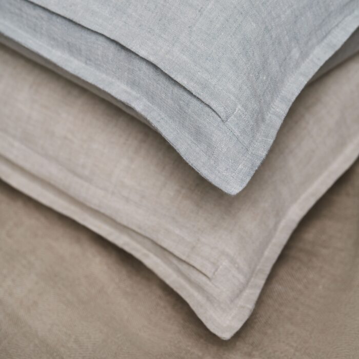 detalle-cierre-cojin-lino-1_l-f3669d18-2fb1-40e4-9698-2ddf446b50e8